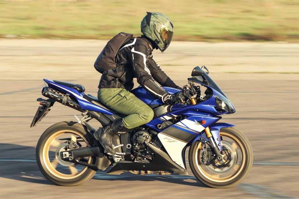 Bike and rider with camo full face helmet